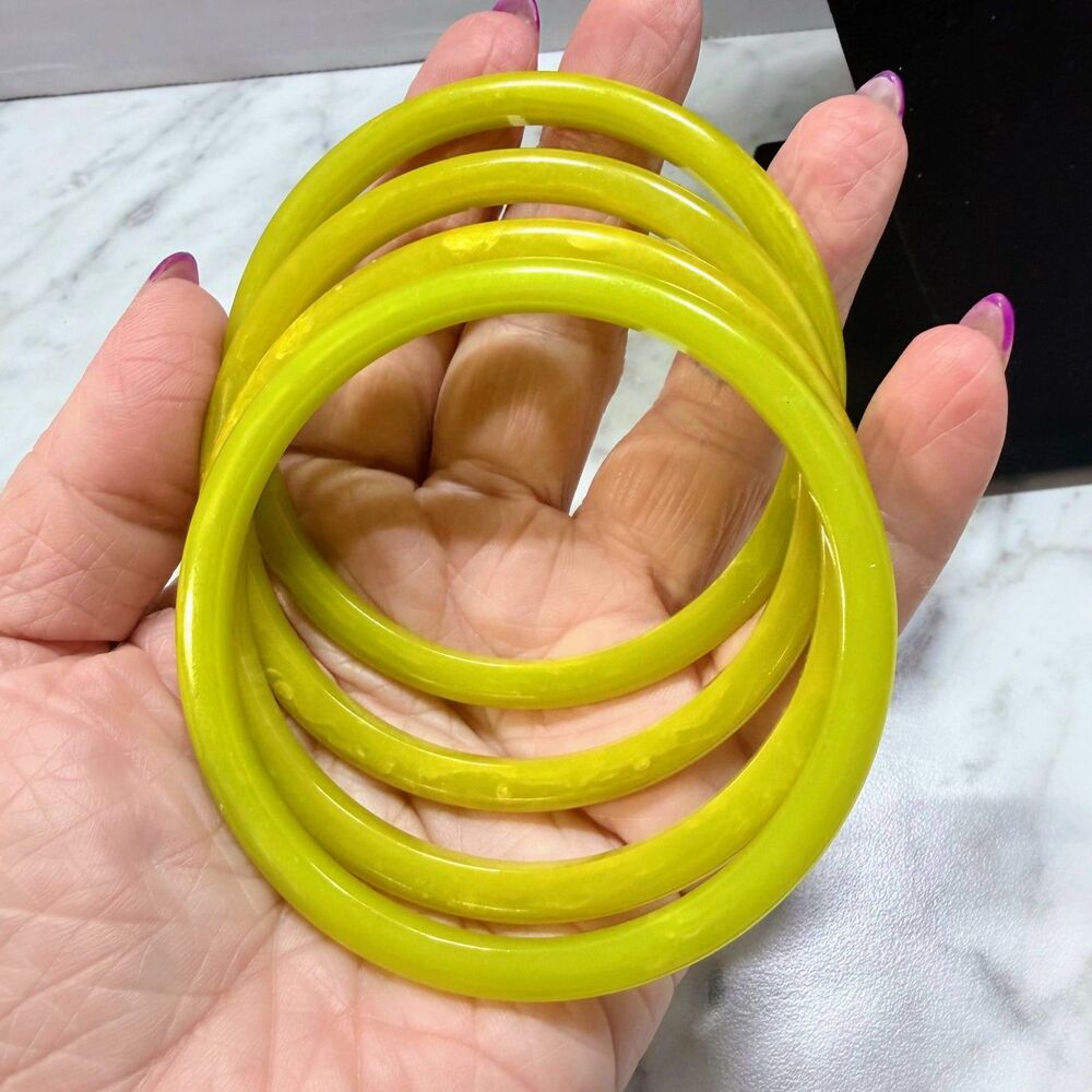Set of 4 Vintage Chartreuse Yellow Bakelite Spacer Bangles